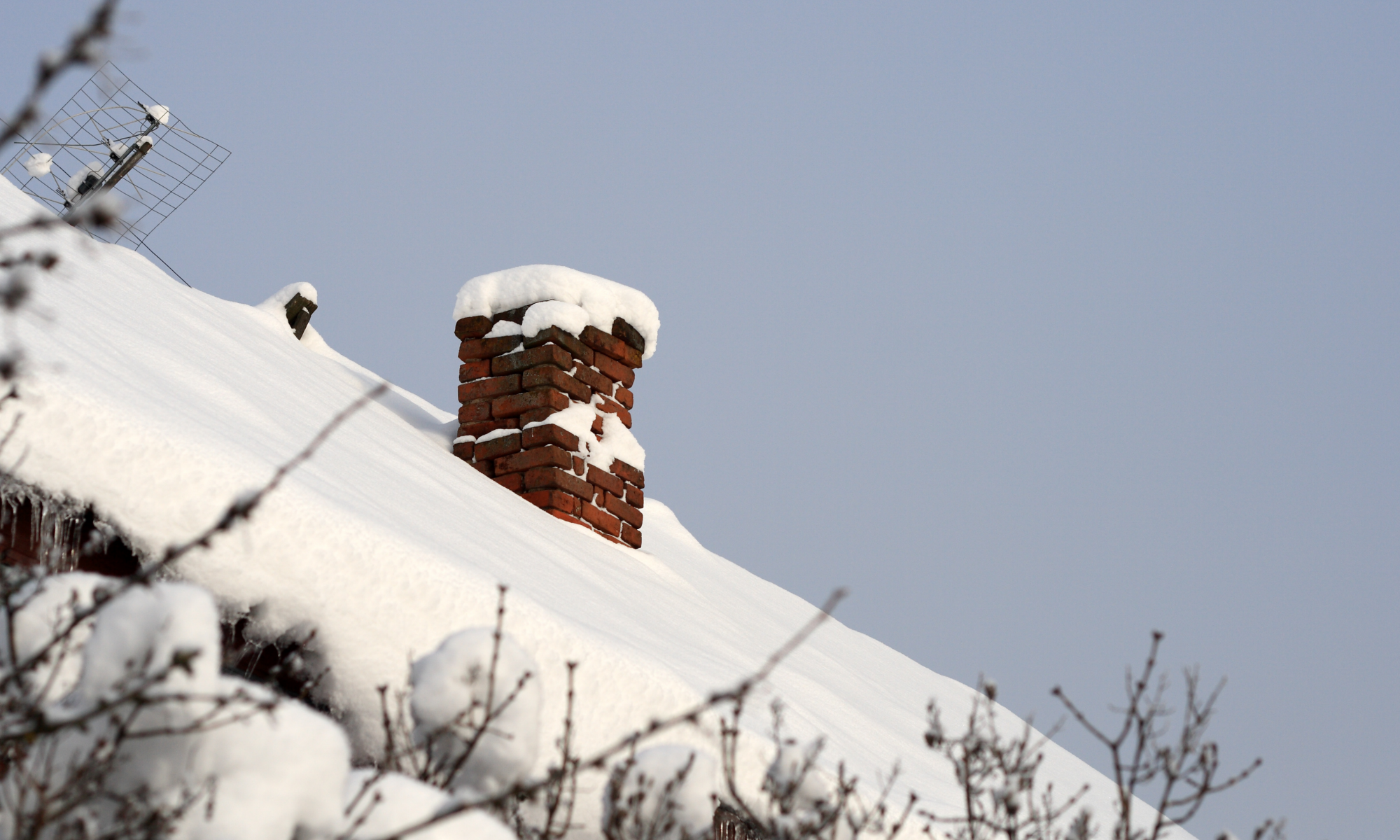 snow on residential roof